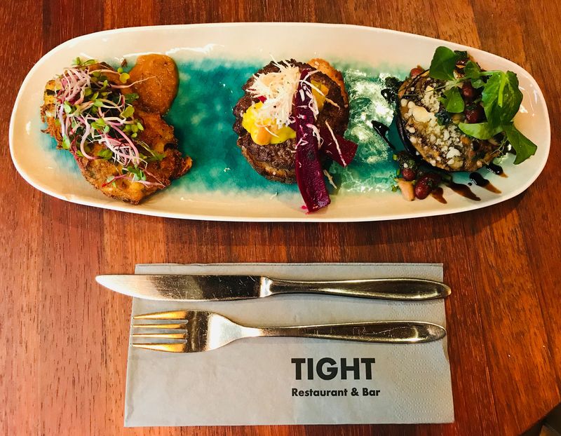 What budget dishes can you try at the tight restaurant in Copenhagen